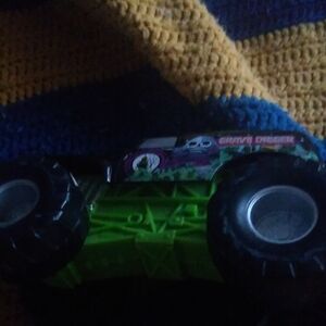 Monster Truck Toy with Green and Black Design